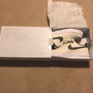 Green and cream Nike Air Force 1s low